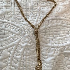 Gold knotted necklace